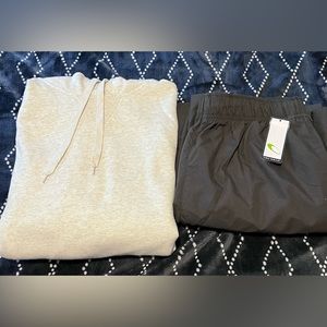 Champion hooded sweatshirt size Large and Tek Gear size Large work out pants.